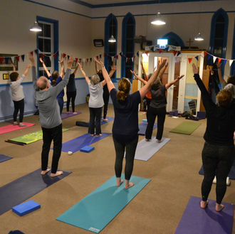 Group yoga class in Pott Row Kings Lynn