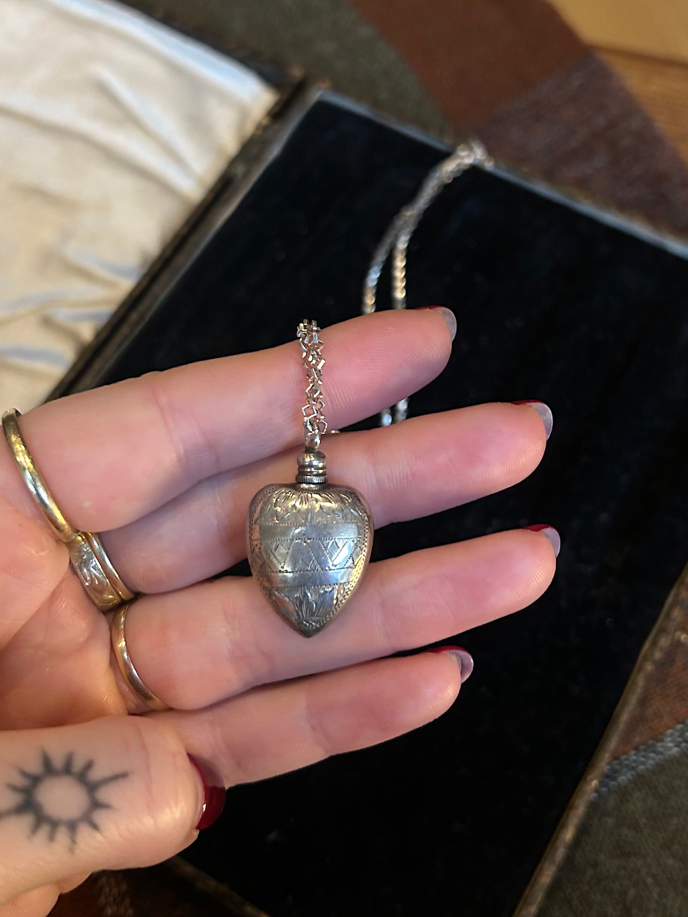 Silver Perfume Bottle and Chain