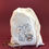 Miniature : Petit sac en coton de couleur beige. Dessus il y a un motif Harry Potter, brodé grâce au kit de broderie MIkactus.