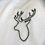 Miniatura: Photo prise de très près pour voir la broderie faite main grâce au kit de broderie sur t-shirt.
