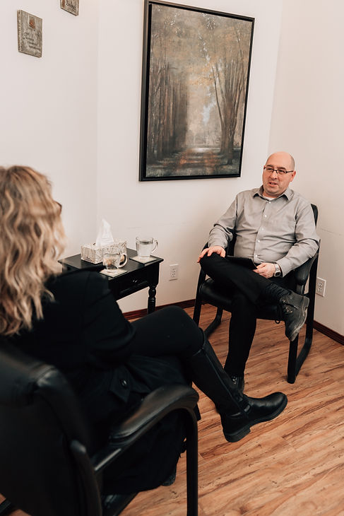 Clayton Falk Providing Therapy at the Airdrie Counselling Centre