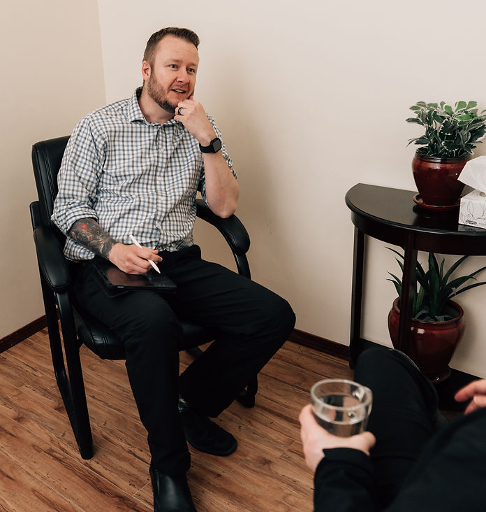 Dason Harker providing therapy at the Airdrie Counselling Centre
