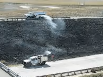 Fort Morgan Fire Department extinguishes a grass fire at I-76 & Long Bridge