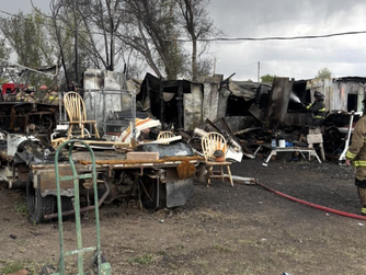 The Sterling Fire Department, along with assisting crews, extinguished a structure fire that was spreading to nearby vehicles