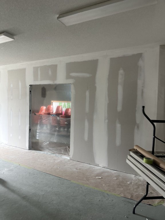 Faith Evangelical Lutheran Church interior showing dual-use potential for daycare and active church space