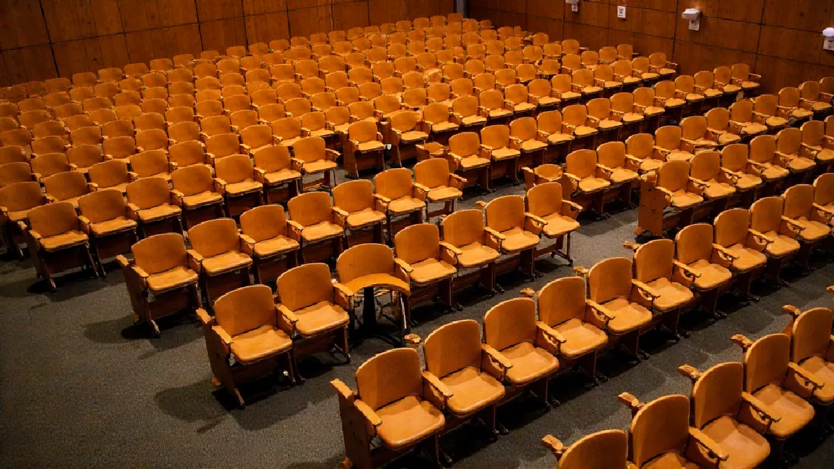 An empty regional meeting room conveys that the report describes no comparable U.S. state action.