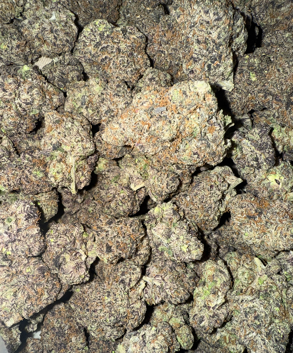 Close-up of Cherry XO hybrid strain showcasing frosty buds, smooth smoke quality, and fruity terpene profile