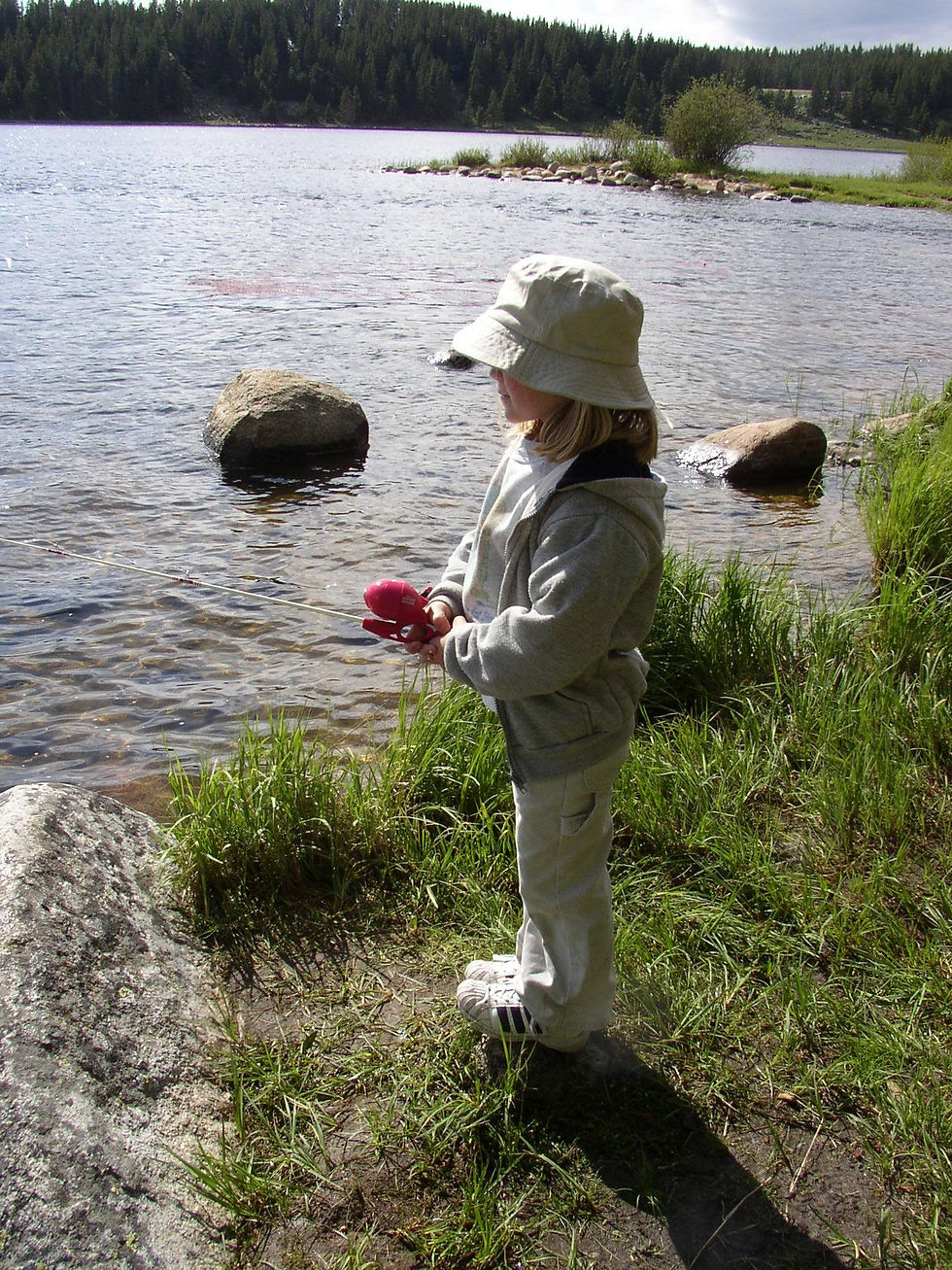 Little girl fishing in Wyoming
