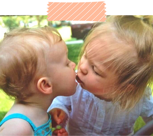 Two kids kissing