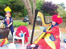 Debbie from Carmel Valley's Baum & Blume on the drum, Harpist Susan Bradley on the Harp.