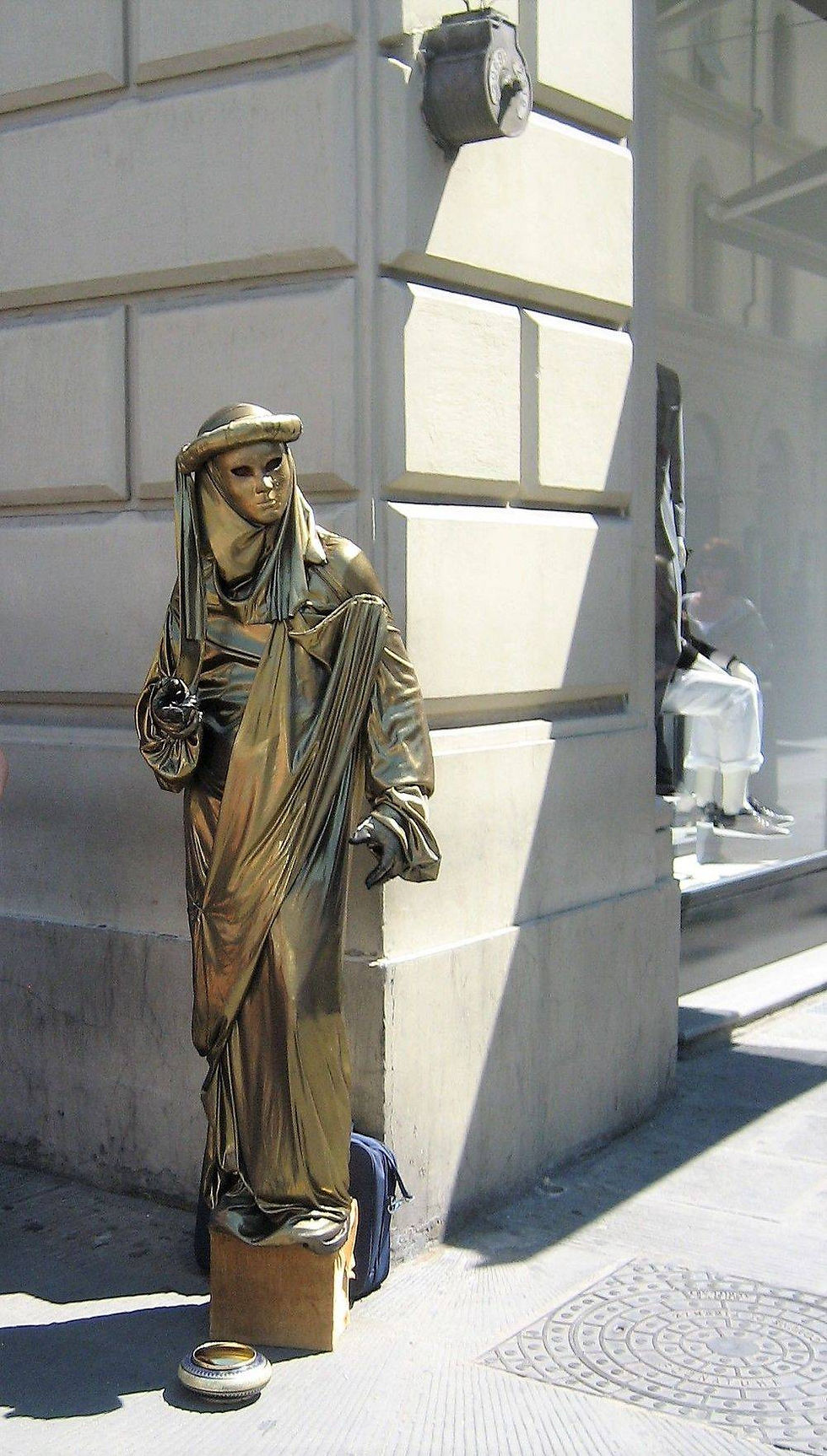 Florence, Italy, entertainment, busker, human gold statue, buildings, market, square, piazza, pictures, photography