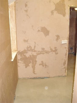 Changing room refurb during .... (view into changing room from kitchen) walls plastered & floor levelled