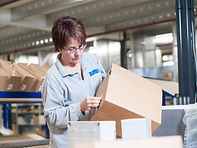 Warehouse clerk receiving packages