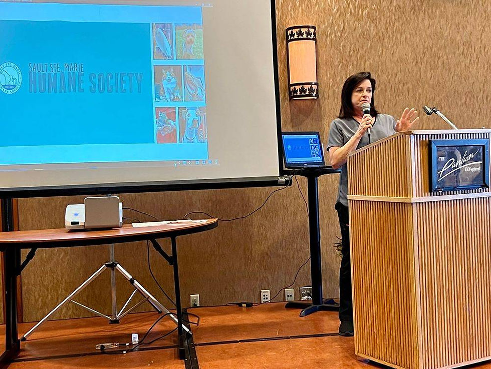 Representative from the SSM Humane Society delivering a presentation.