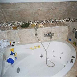 Tiler, bathroom fitter, decorator, plumber, joiner, bathroom fitter, walk in shower instalations,