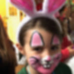 Girl with a bunny rabbit face paint