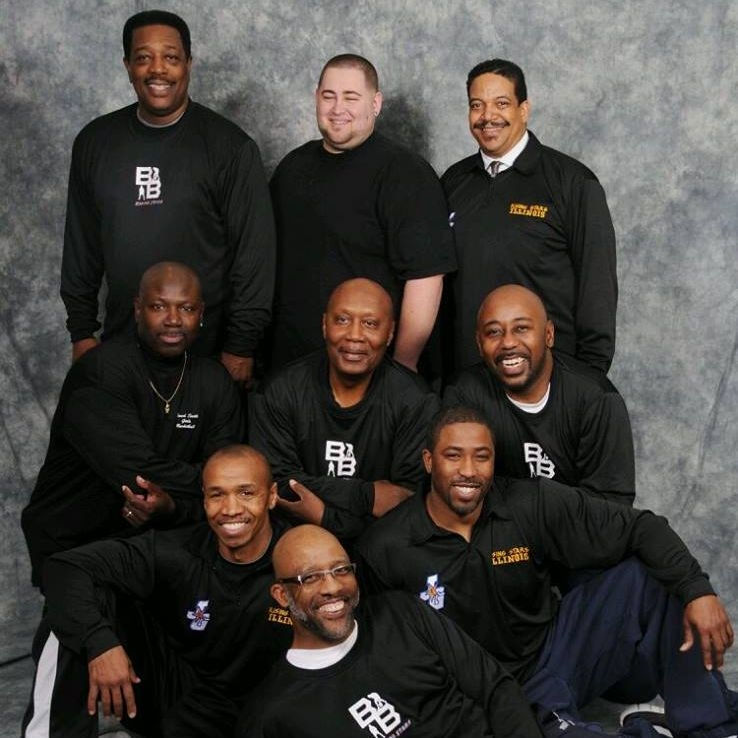 Men wearing black tops