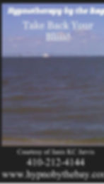 Eye-level view of a journal and pen on a wooden table