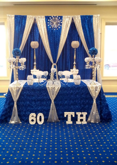 Blue, White, and Silver Head Table