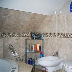 Tiler, bathroom fitter, decorator, plumber, joiner, bathroom fitter, walk in shower instalations,