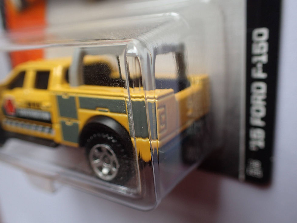 Miniatura: 2015 Ford F-150 Pickup Contratista IAN M.K. Construcción Amarillo Metálico Matchbox