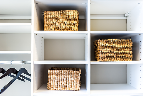 A shelf with woven storage bins