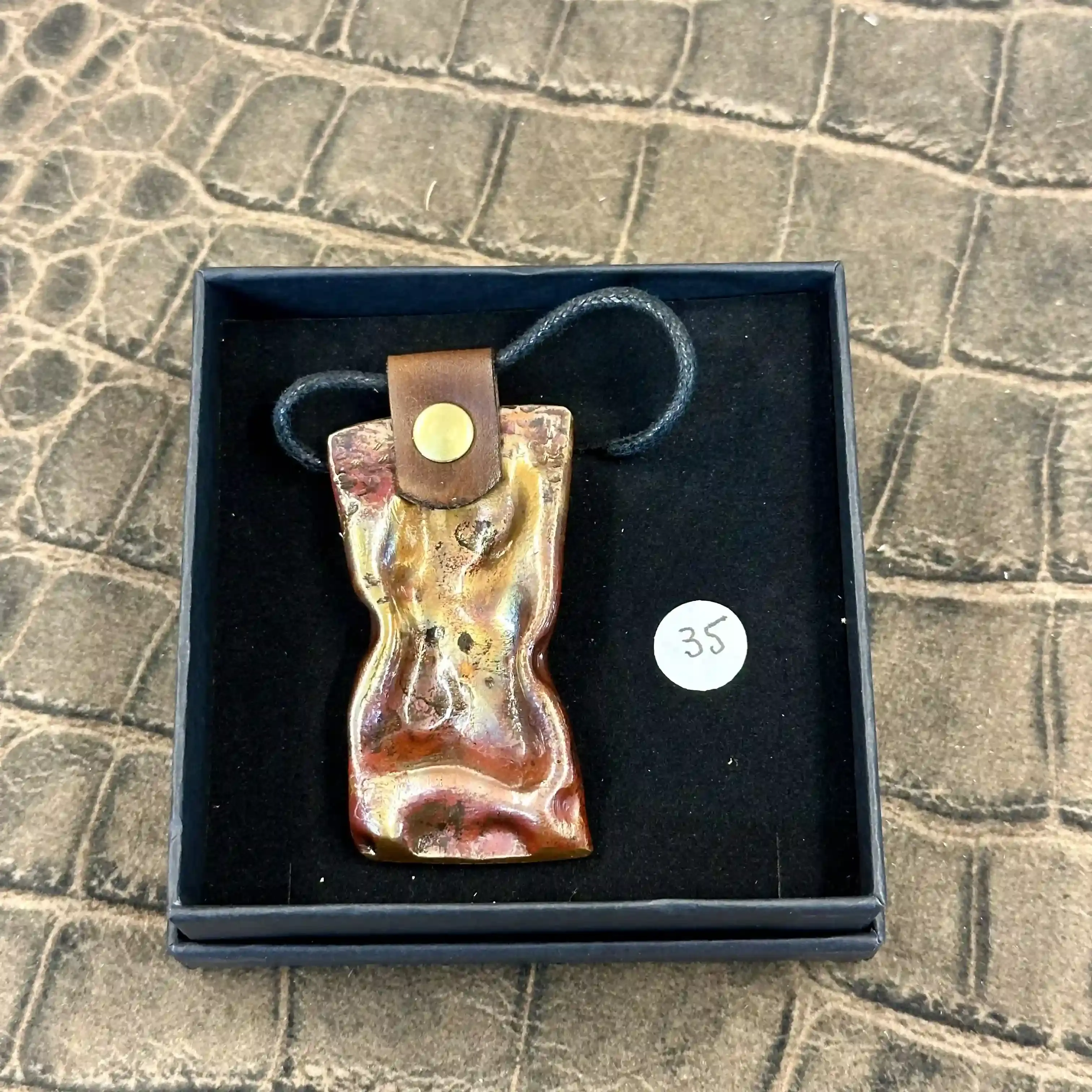 Pendentif cuivre flammé