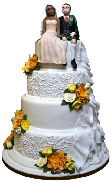 Three-tiered wedding cake with sugar paste flowers and intricate lace patterns.
