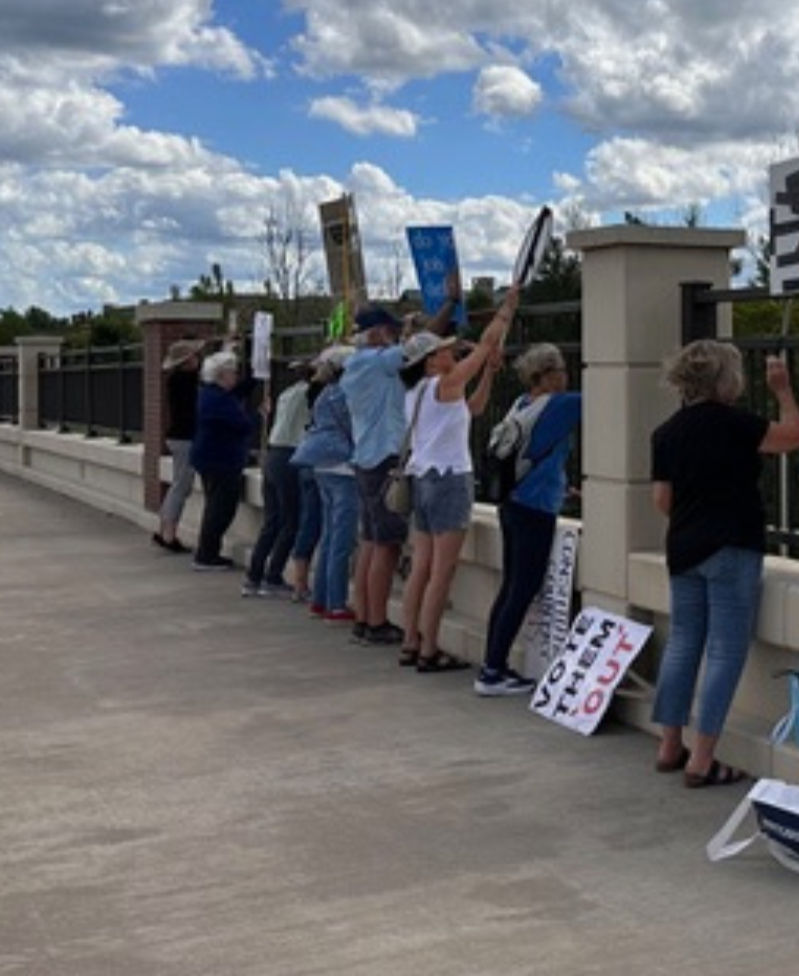 People at an event for progressive action in Woodbury.