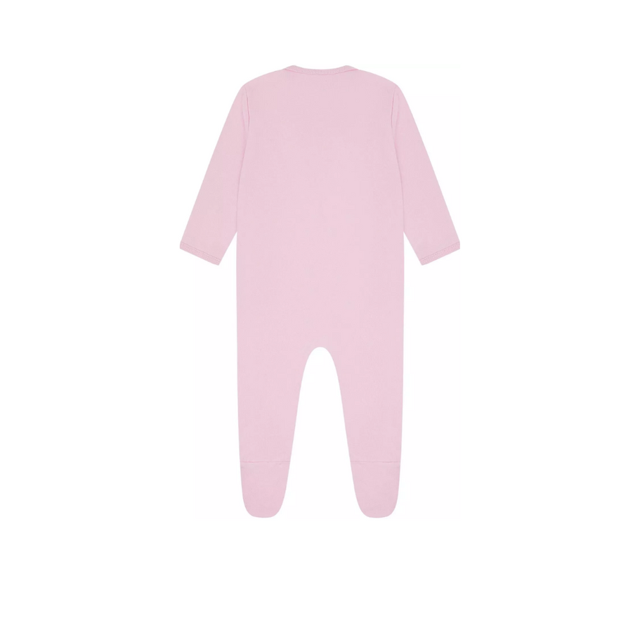 Flat lay of multiple baby bodysuits arranged in different sizes