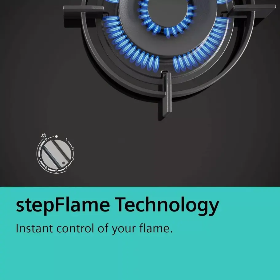A close-up view of the Siemens EC6A5PB90 Gas Hob’s burners, with the flame on one of the burners, highlighting the precise co