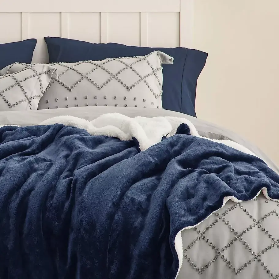 Sherpa fleece throw in mink color, offering ultimate softness and warmth for your sofa or bed, available in double and king s