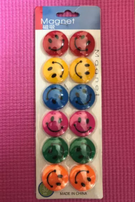 Smiley face fridge magnets with strong magnets, perfect for holding memos or notes on whiteboards and fridges.