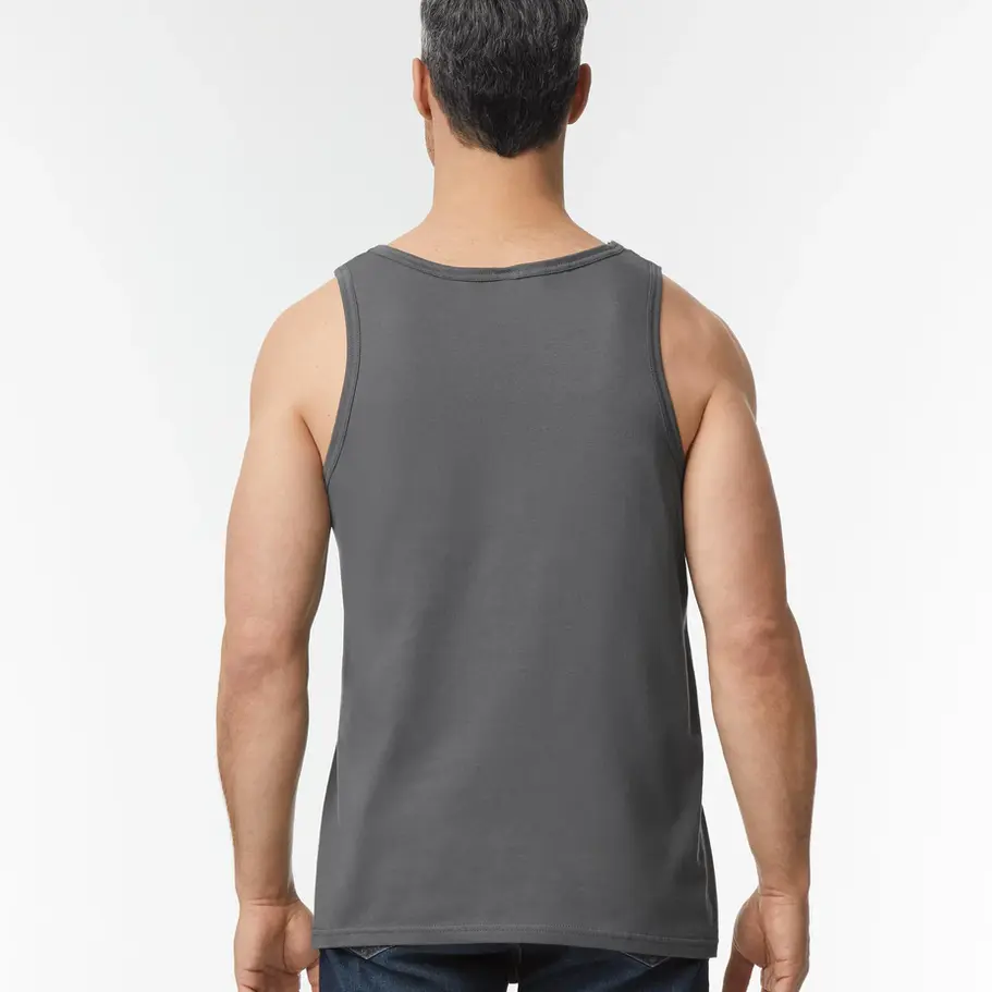 Softstyle ringspun cotton tank top laid flat, showcasing its smooth texture and versatile design, available in multiple color