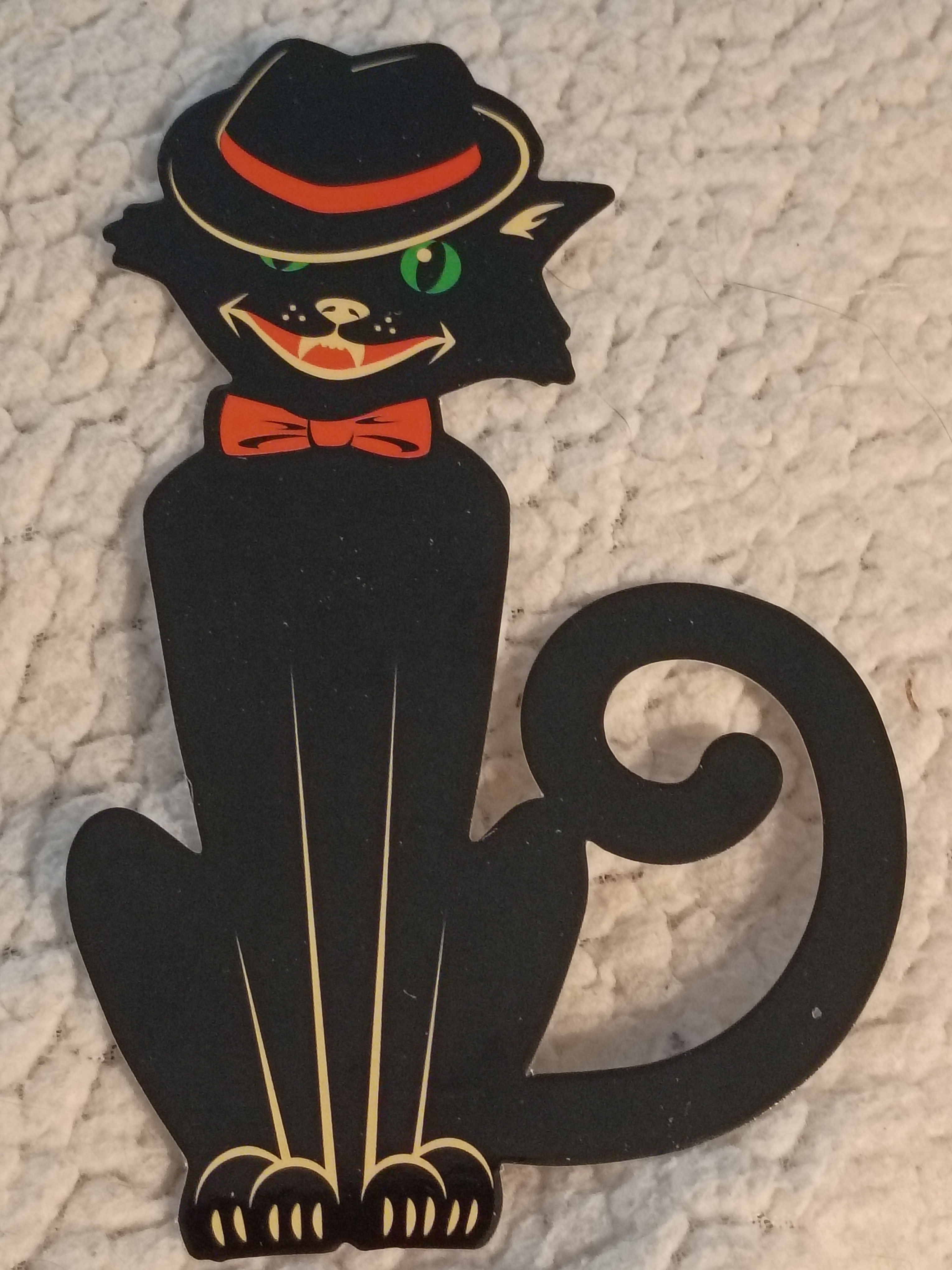 Black cat with bowler