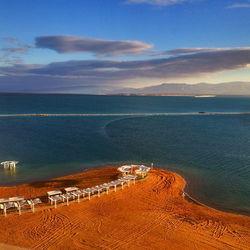 The lowest point on the planet.  Supposedly you can stay in the sun for two days without burning.  N