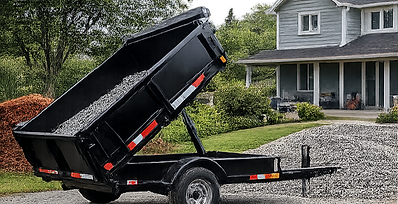 Single axle dump trailer unloading gravel at a residential property, ideal for landscaping, yard projects, and light-duty hauling.