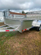 The 2027 Canadian Made 6x10 Aluminum Utility Trailer combines lightweight aluminum construction with a 3,500 lb drop axle, hardwood deck, fully welded box and six D-ring tie-downs. A versatile single axle utility trailer backed by a 3-year manufacturer warranty.