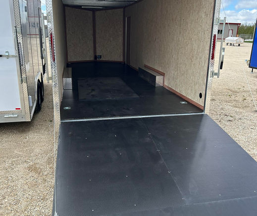 interior view enclosed trailer ramp door open wide cargo space.jpg