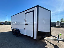Premium 2026 Canadian Made 7x16 V-nose enclosed trailer featuring a galvanized frame, Whiteout package, tandem 3,500 lb axles with brakes on both axles, ramp door, side entry door, and full tubular construction.