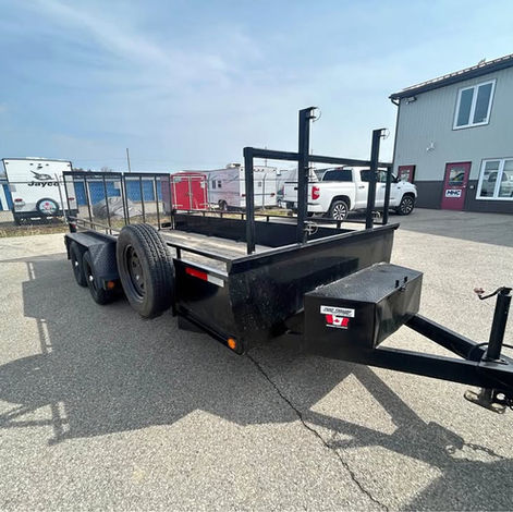 Used 7x16 landscape trailer with 7K GVWR, split gate, new tires, and ready for daily hauling.