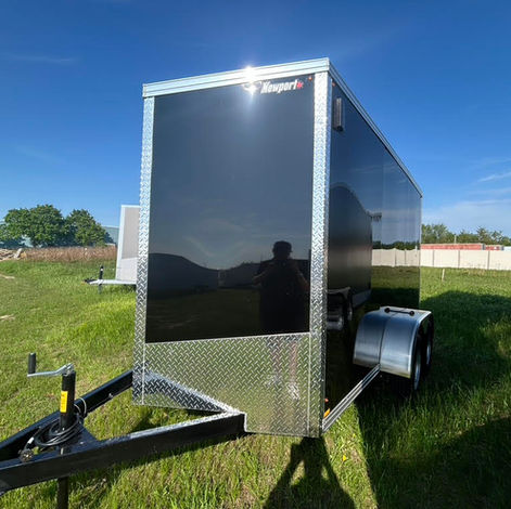 This 2026 Canadian-made 6x12 enclosed trailer combines the convenience of tandem axles with premium construction features including a ramp door, side door, DryMax flooring, LED lighting, and full tubular frame construction. Ideal for contractors, homeowners, powersports, and cargo hauling.