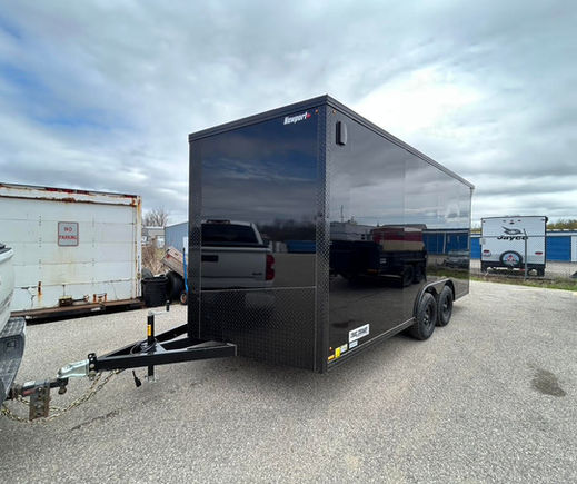Front angle of 8.5x16 enclosed cargo trailer with black poly siding