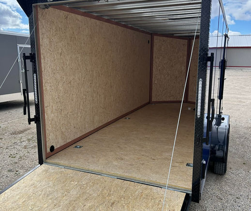 interior view enclosed trailer ramp door open Drymax flooring and walls