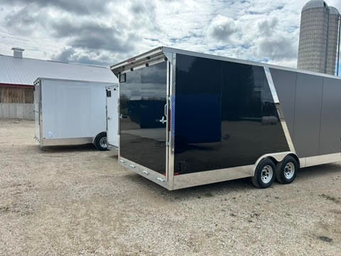 rear angle enclosed trailer with ramp door closed