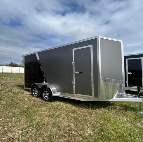 7x16 aluminum enclosed trailer with tandem 3500 lb axles, rear ramp door, poly composite two-tone siding, mag wheels, and 7’ interior height. Built with 16” OC construction and premium aluminum features.