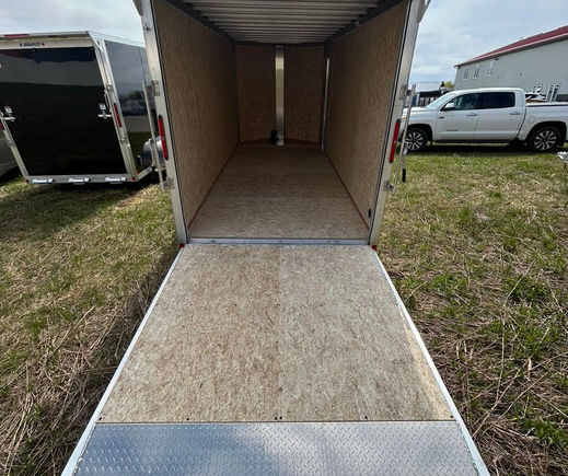 Interior of 7x16 enclosed cargo trailer with ramp door