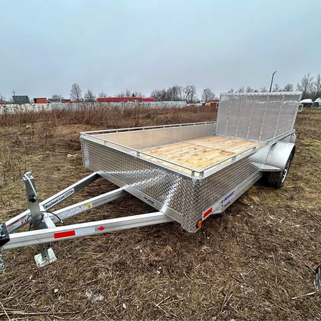 7x14 aluminum utility trailer with 3.5K axle, hardwood deck, and lightweight corrosion-resistant build.