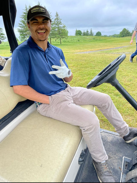 Motion Services team member enjoying a golf day event near Fergus Ontario