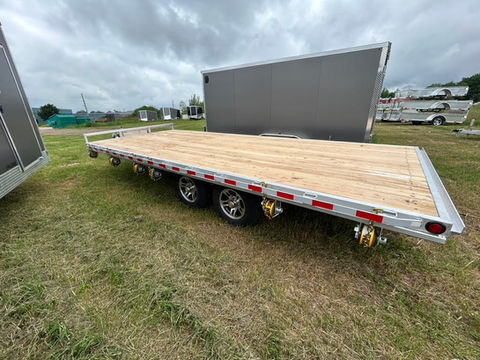 Looking for a lightweight yet durable deckover trailer? This Canadian-made 2026 102x20 Aluminum Deckover Trailer features full aluminum construction, dual 5,200 lb axles, hardwood decking, an adjustable coupler, integrated toolbox, and a weld-on winch track. Built for hauling equipment, vehicles, building materials, and more while reducing trailer weight and resisting corrosion.